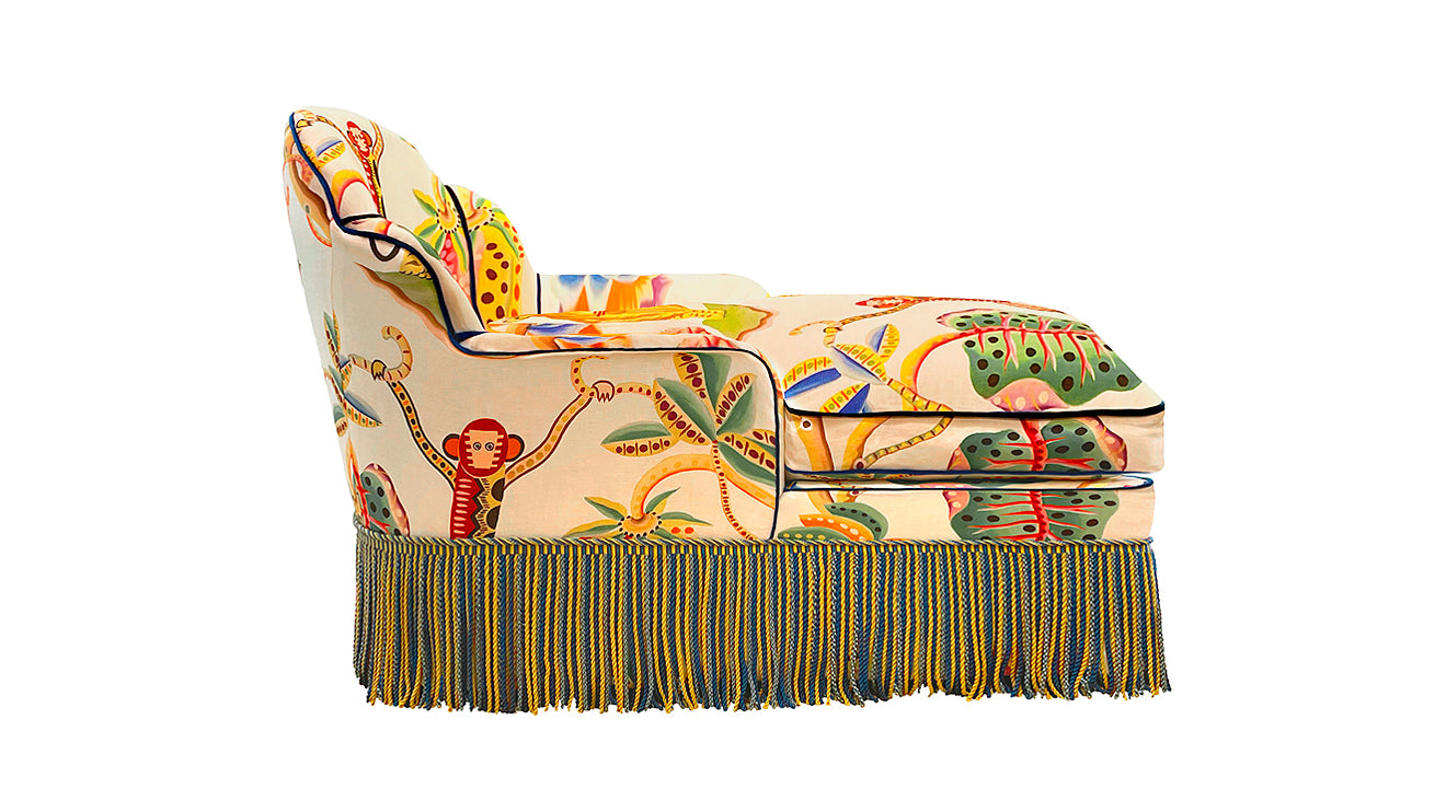 David Seyfried Editor's Chaise Grand Scallop in Clarence House Jembala Print Original fabric with Turnell & Gigon Oakley Navy Blue velvet piping and Les Passementaries de I'le de France Paon bullion fringe. Side view