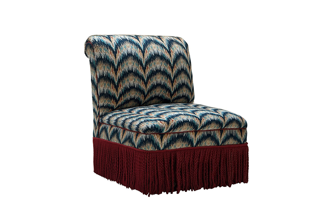 David Seyfried Phillimore Chair in Patrick Gallagher Festoni Dazzling Riviera fabric with Les Passementeries de l'Île de France flanged cord & speciale bullion fringe.