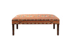 David Seyfried Connaught Stool in Ian Sanderson Juni Stripe Terracotta fabric with antiqued brass crossover nailing