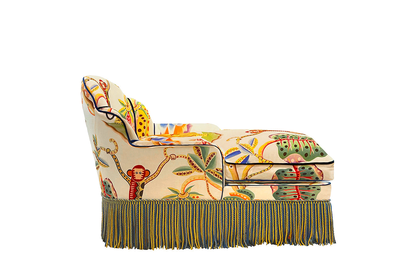 David Seyfried Editor's Chaise Grand Scallop in Clarence House Jembala Print Original fabric with Turnell & Gigon Oakley Navy Blue velvet piping and Les Passementaries de I'le de France Paon bullion fringe. Side view