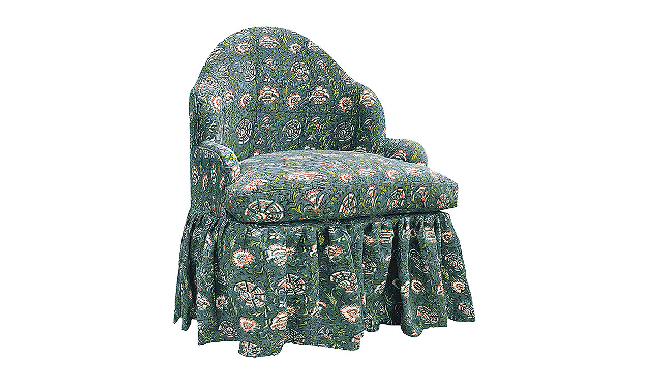 David Seyfried The Editor's Chair Grand on a swivel base with skirt,  in  Filling Spaces Nisa Niva fabric.