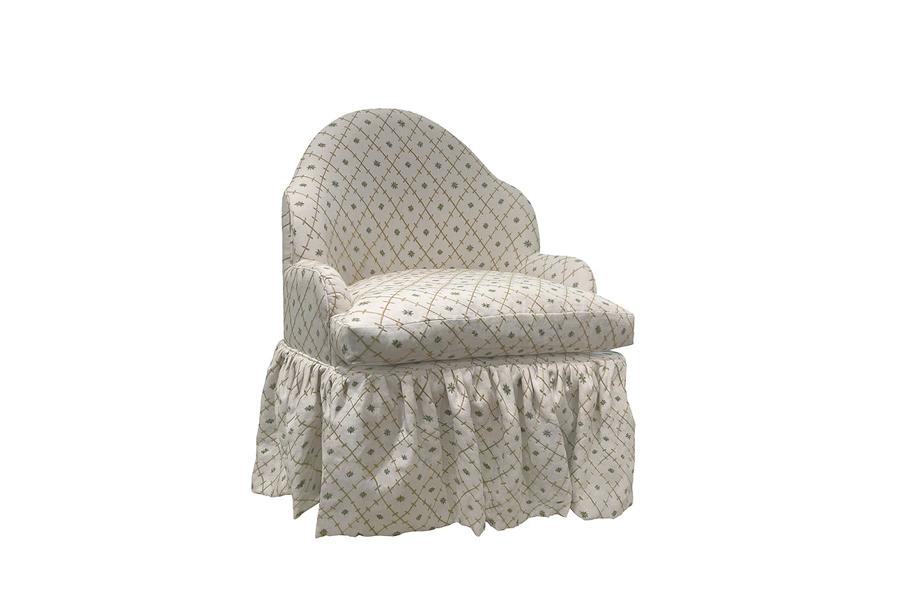 David Seyfried The Editor's Chair Grand on a swivel base with skirt, in Paris Lapres-Midi Allee Maintenon fabric