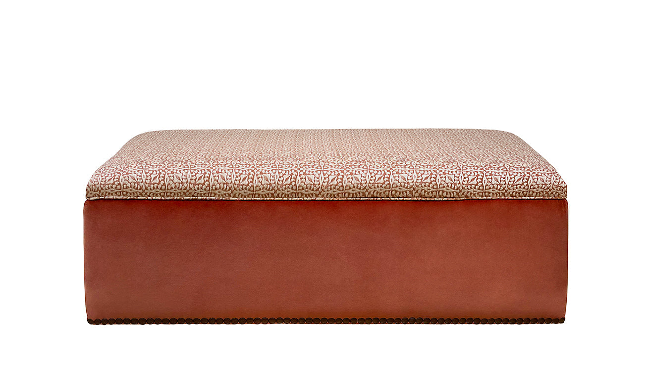 David Seyfried McCall stool in Susan Deliss Constanza in Antique Pink and Jane Clayton Ice II Fabric by Kirkby Design with a single row of large nails around base