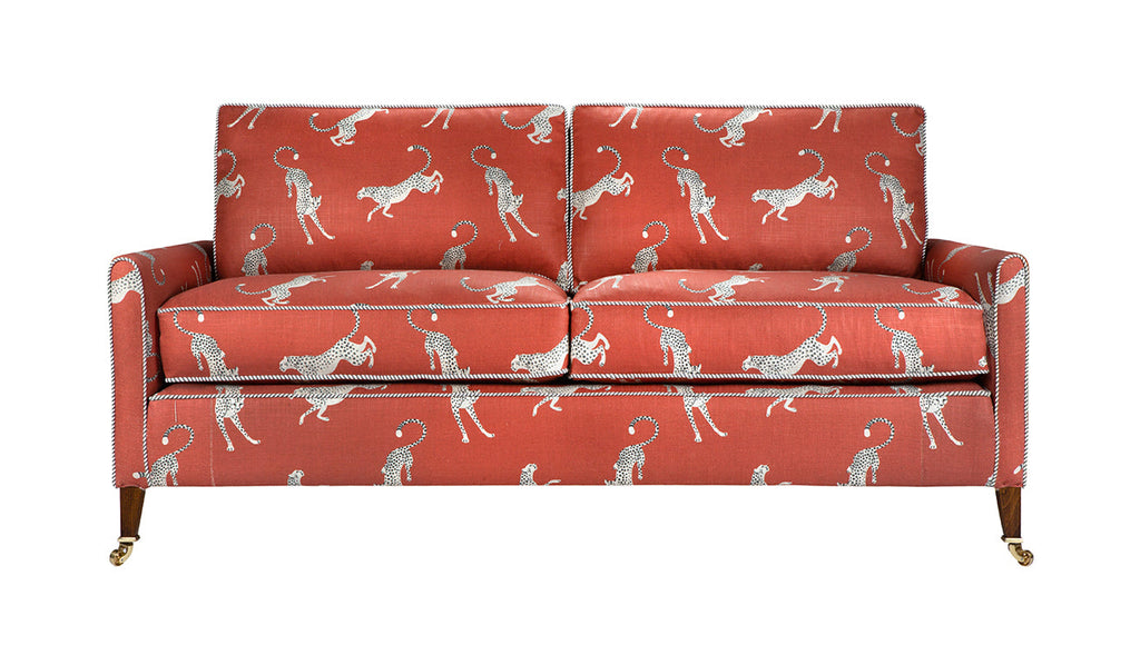 David Seyfried Sanford sofa in  Altfield Bagheera Chili fabric with Romo Stripe piping